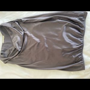 Silk sleeveless blouse with scoop neck. Elegant!